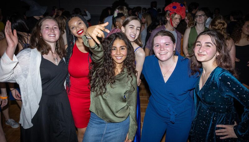 Students dancing during Homecoming in formal attire