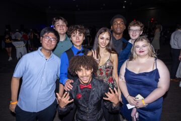 Students dancing during Homecoming in formal attire