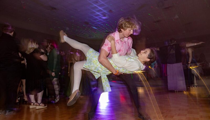 Students dancing during Homecoming in formal attire