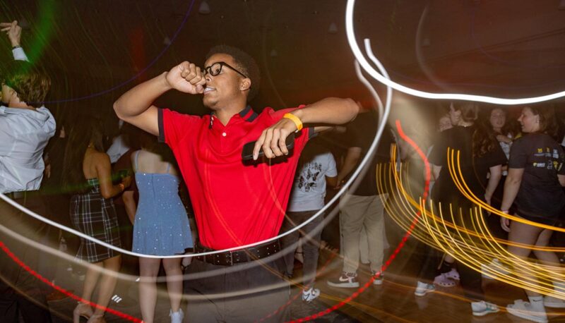 Students dancing during Homecoming in formal attire