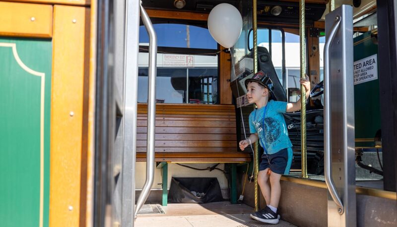 A young child exploring a truck