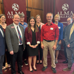 Pictured from left are representatives from Alma College and the University of Michigan-Flint: Tim Pinnow, Nancy Dopke, Sean Burke, Karen Ball, Brianna Harfmann, Julie Jacob, Jeff Turk, Donna Fry, Christopher Lewis and Yener Kandogan.