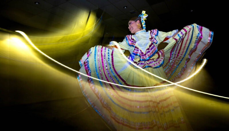 A Folkorico dancer twirling her dress.