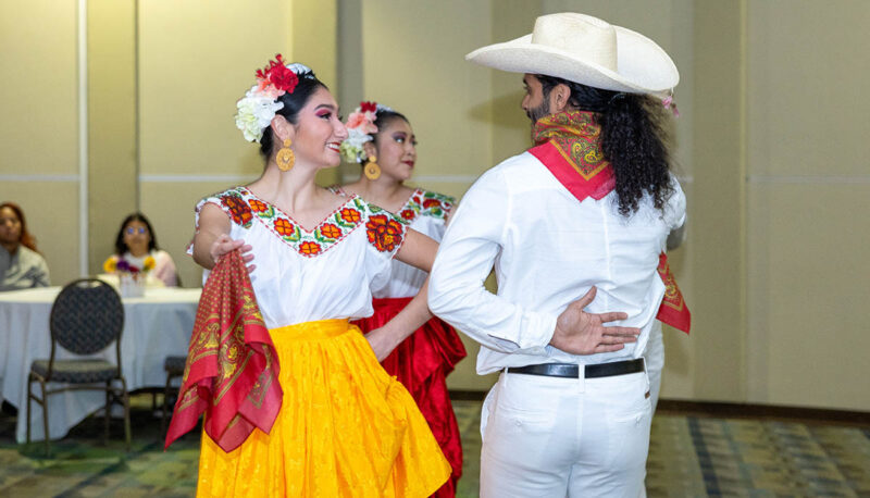 Folkorico dancers in the Happenings Room.