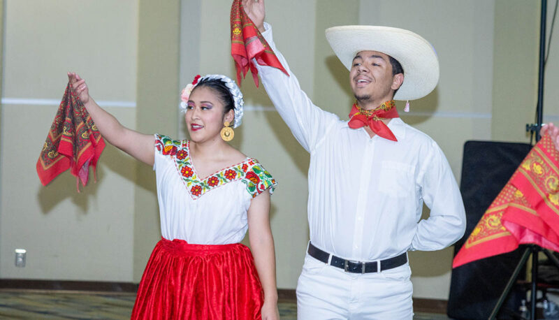 Folkorico dancers in the Happenings Room.