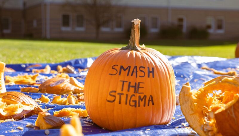 A pumpkin with the words "Smash the Stigma" written on it.