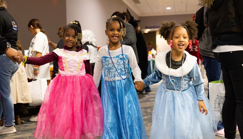 A group of kids in princess costumes.