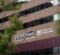 Image of exterior Riverfront Center building with Riverfront Banquet Center and UM-Flint School of Management logos as the focus.