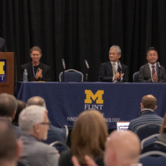 Left to right: Laurence Alexander, UM-Flint chancellor, delivers remarks with Geoffrey Thün, associate vice president for research, social sciences, humanities and the arts at UM-Ann Arbor; Satoshi Hakozaki, CEO of NetSTAR; Yasuaki Arakawa, CTO of NetSTAR; and Jeffrey Yackley, assistant professor of computer science at UM-Flint.