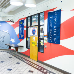 A photograph inside the University Pavilion of the entrance to the Student Veteran Resource Center