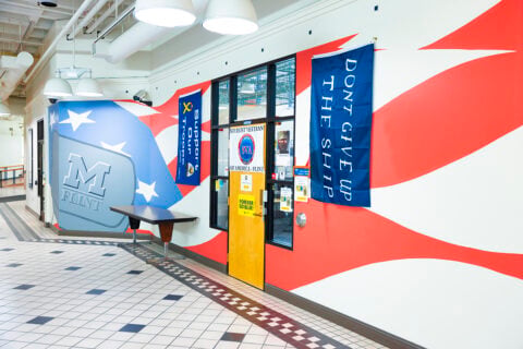 A photograph inside the University Pavilion of the entrance to the Student Veteran Resource Center