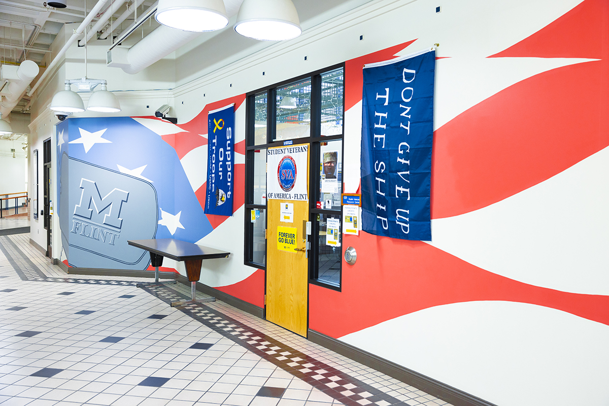 A photograph inside the University Pavilion of the entrance to the Student Veteran Resource Center