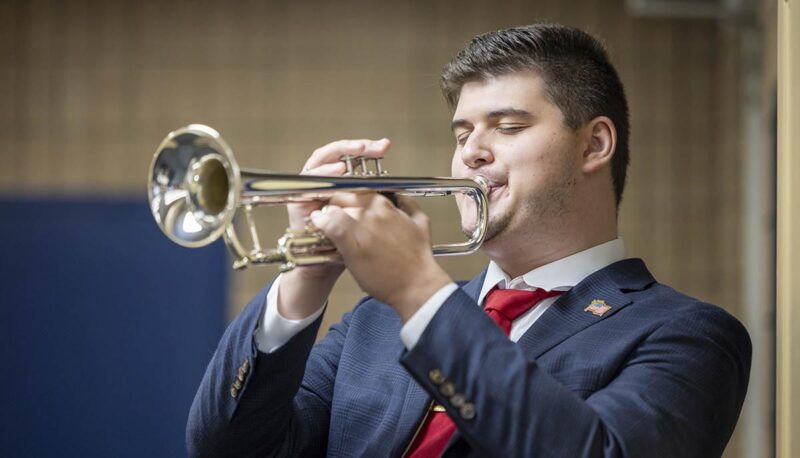 A student playing the trumpet.