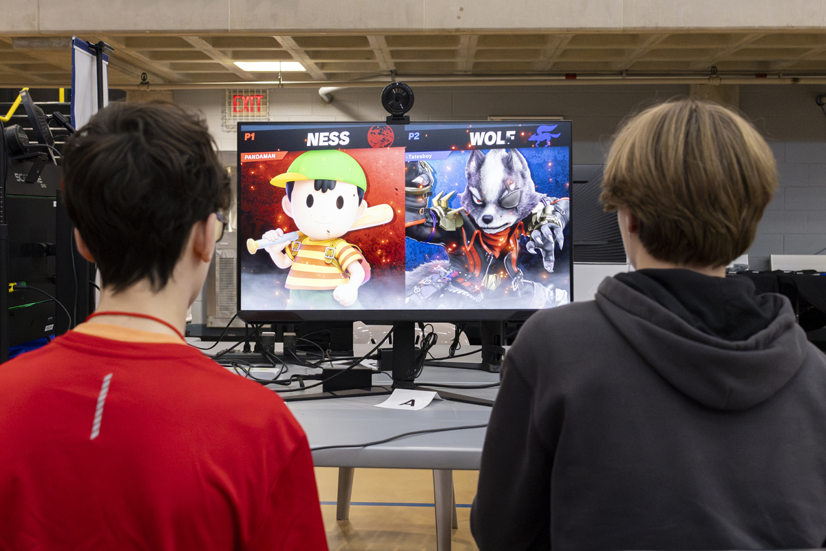 Two players view a character selection screen during a gaming match.