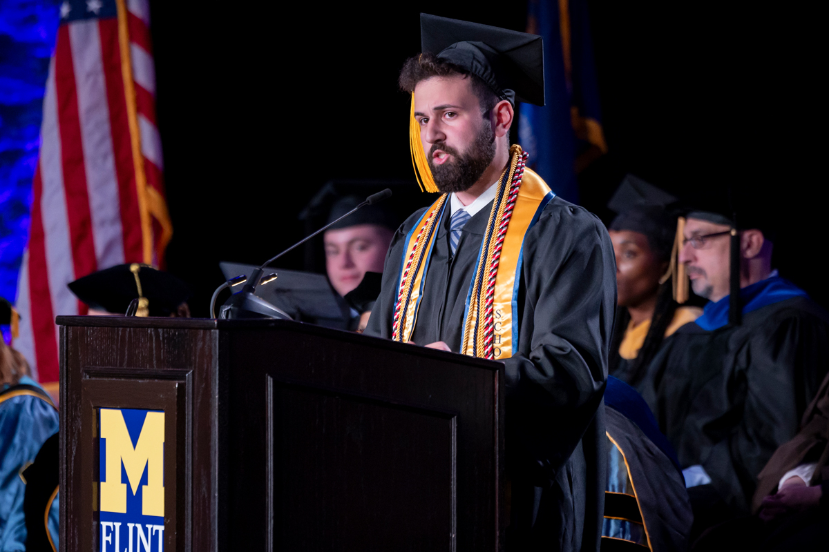 Sami Kotob, a University of Michigan-Flint graduates, speaks during commencement ceremonies, Dec. 15.