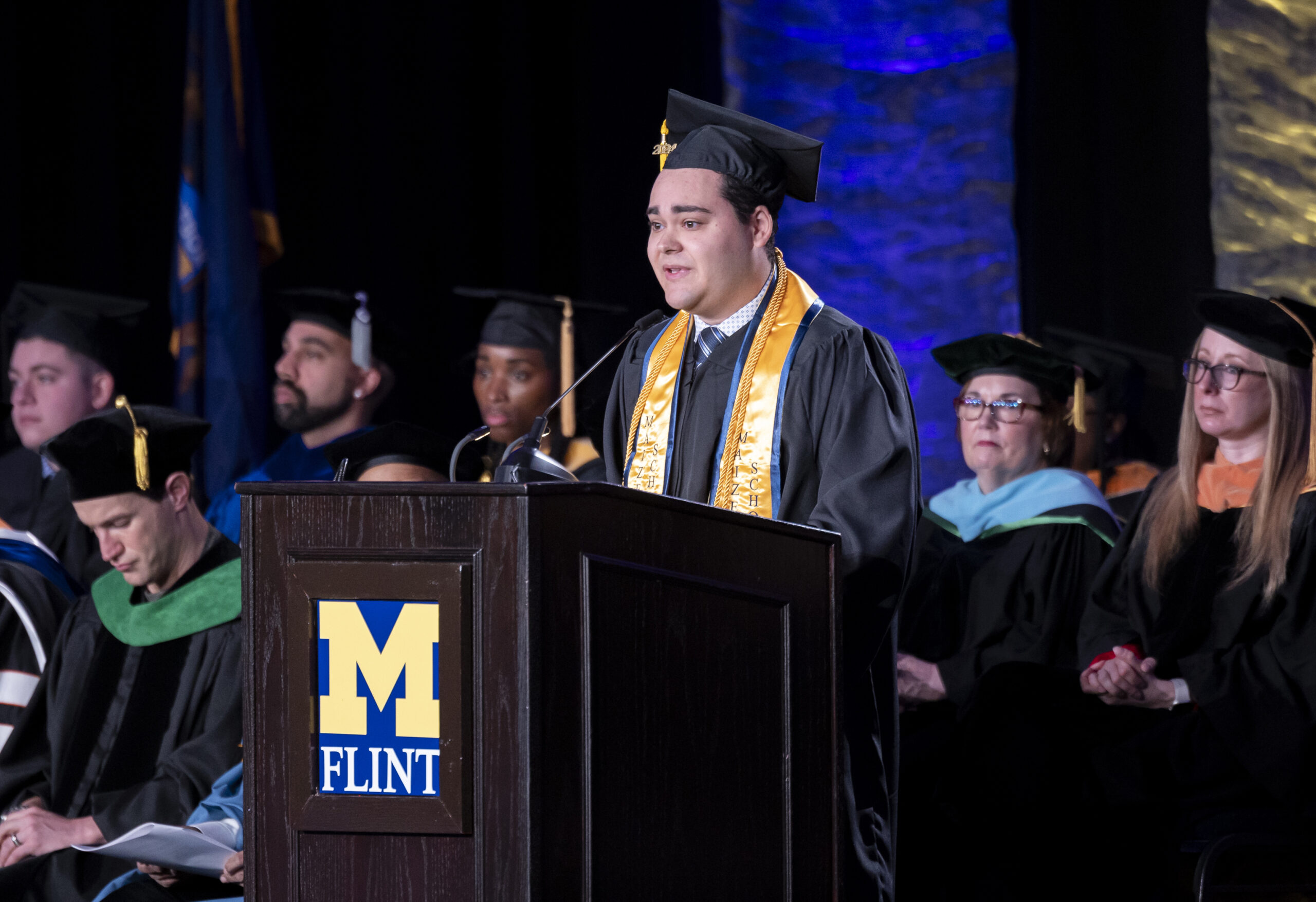 Student speaker Salvatore DiMaggio stands at the podium.