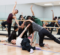 A group of dancers performing in a dance studio