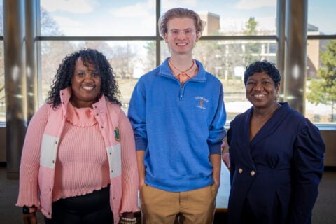 Pictured from left to right are MHED program associate RoShawndra Opara, sophomore elementary education major Nathan Malone of Flushing and MHED program manager Bianca Torbert.