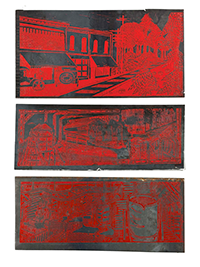 An art piece featuring three printed panels of red ink on gray background, showing buildings, vehicles, and industry
