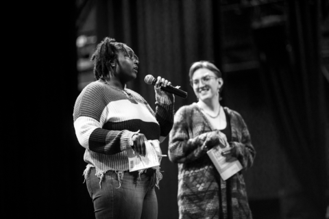 A black and white photo of two actors during a theatre rehearsal