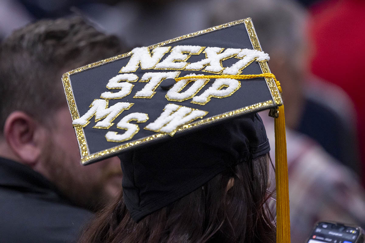 A decorated graduation cap that says "Next stop MSW"
