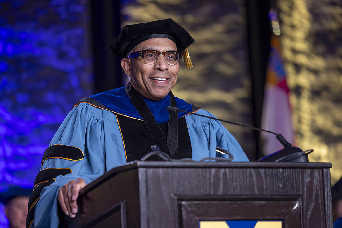 Chancellor Alexander speaking at the podium.
