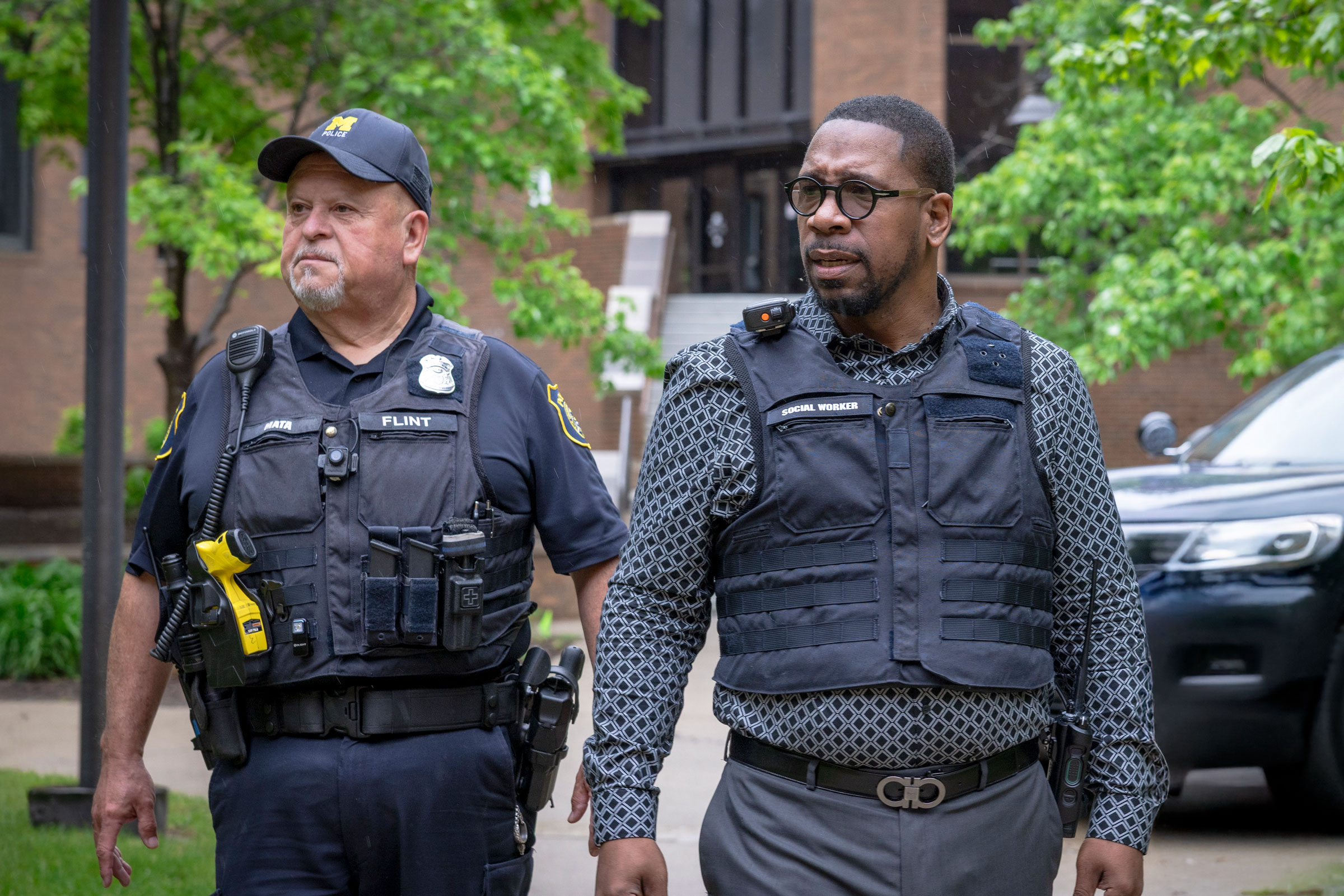 Police officer and department social worker arrive to the scene of a call.