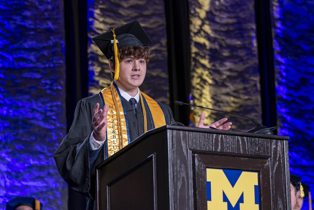 Blake Ackerman speaking at the podium