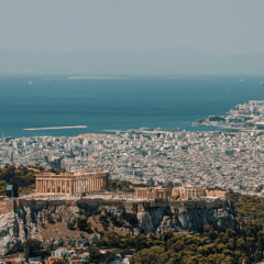 The city of Athens with the Mediterranean Sea in the background
