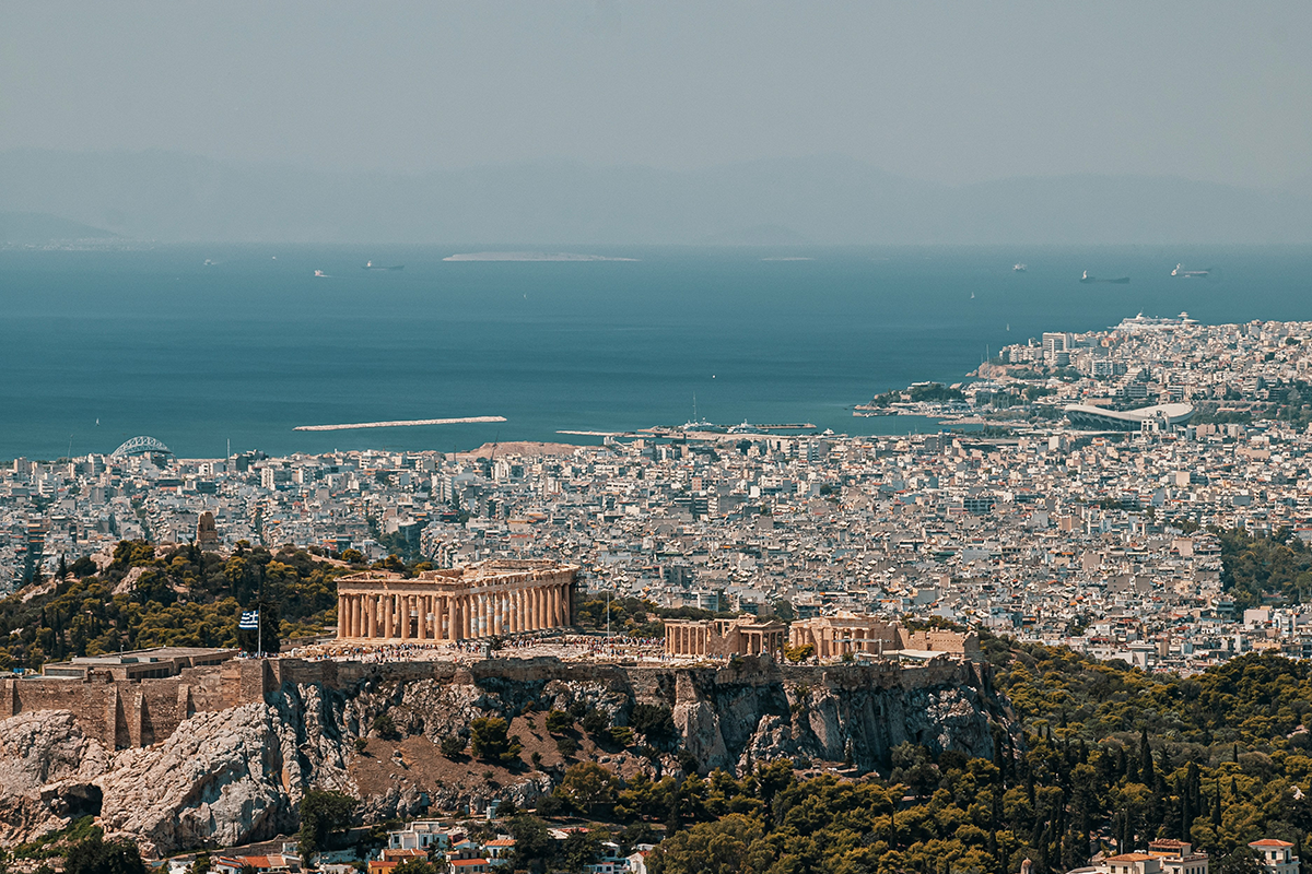 The city of Athens with the Mediterranean Sea in the background