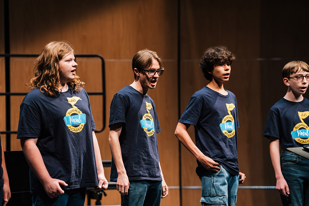 A group of vocalists on stage during the Summer Vocal Academy of music.