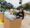 UM-Flint students carting their belongings inside.
