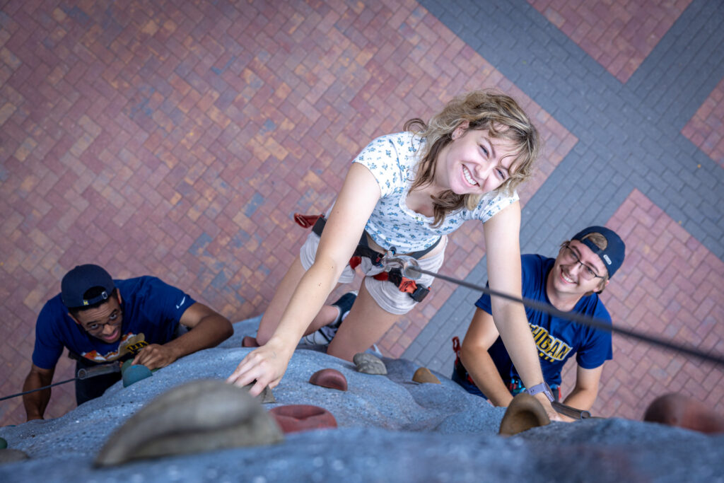 Students try out a rock wall during last year's R'extravaganza