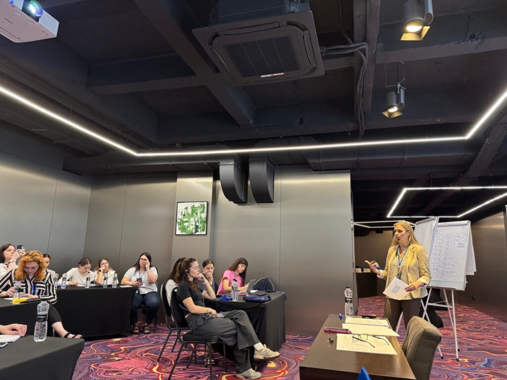 Julie Jacob conducting a presentation on fieldwork assessment