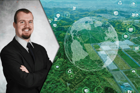 A professional photo of Christopher Mayes in a business suit with a photo of green fields with technological icons overlaid.