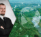 A professional photo of Christopher Mayes in a business suit with a photo of green fields with technological icons overlaid.
