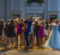 Students in formal wear dancing on the dance floor of the Northbank Ball ROom