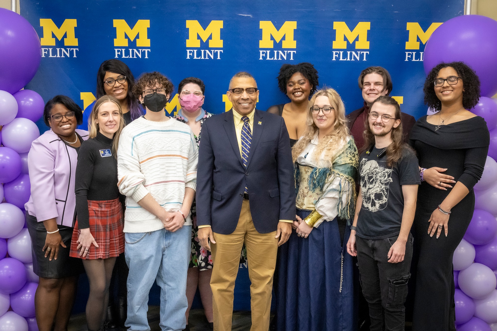 Students and staff from CGS pose with Chancellor Alexander.