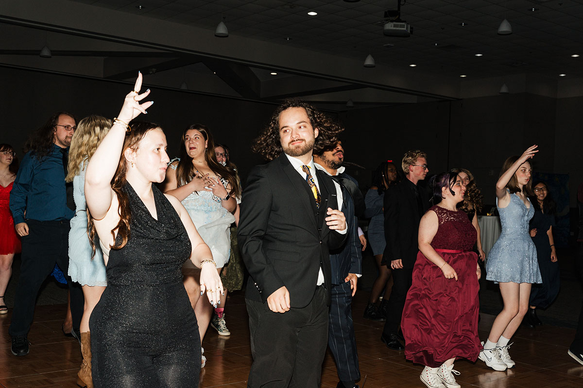 A group of students dancing on the dance floor