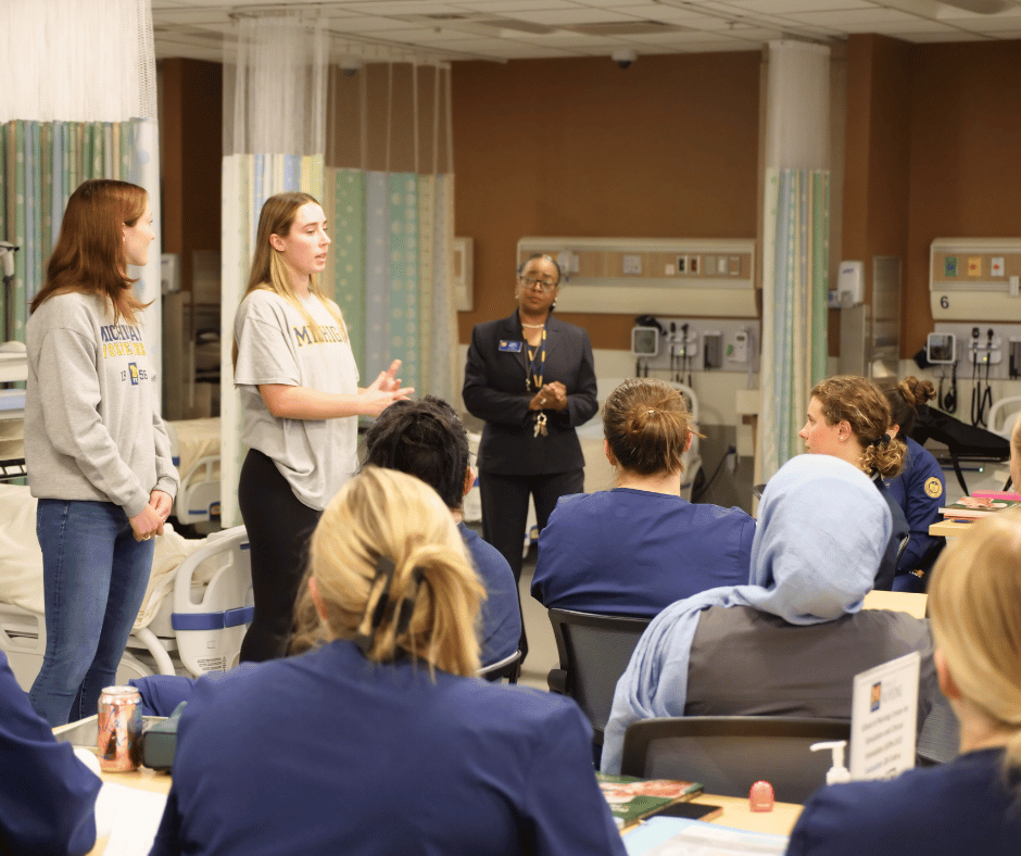 Bell works with past Student Nurses Association members to lead a session focused on study habits and mental health to new nursing students