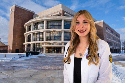 Adeline Walker in front of William S. White Building