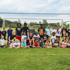 A group photo from last years UM-Flint Women's Club Soccer camp.