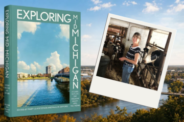 A book titled "Exploring Mid-Michigan" with a photo of a woman smiling in a barn surrounded by cows.