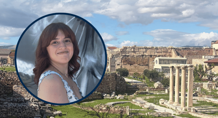 A portrait of a woman with wavy brown hair, smiling, is overlaid on a scenic view of ancient ruins with columns and stone structures under a blue sky.