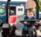 Attendees explore emergency and service vehicles during the University of Michigan-Flint Department of Public Safety Touch-a-Truck event.